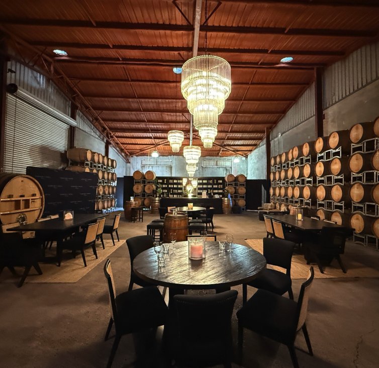 A barrel hall set with tables for a Hunter Valley tasting